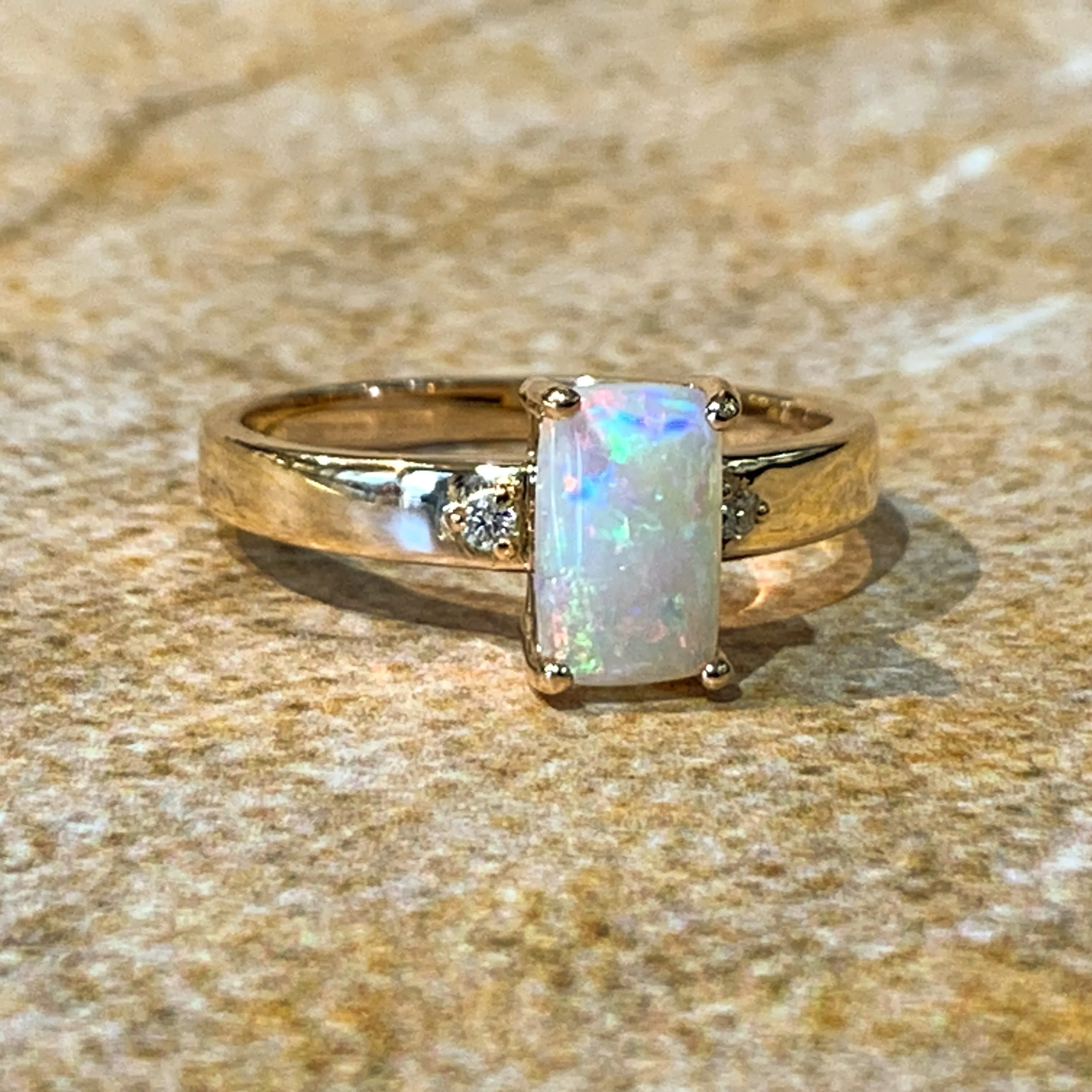 18kt Rose Gold Rectangular Opal 0.9ct and Diamond ring