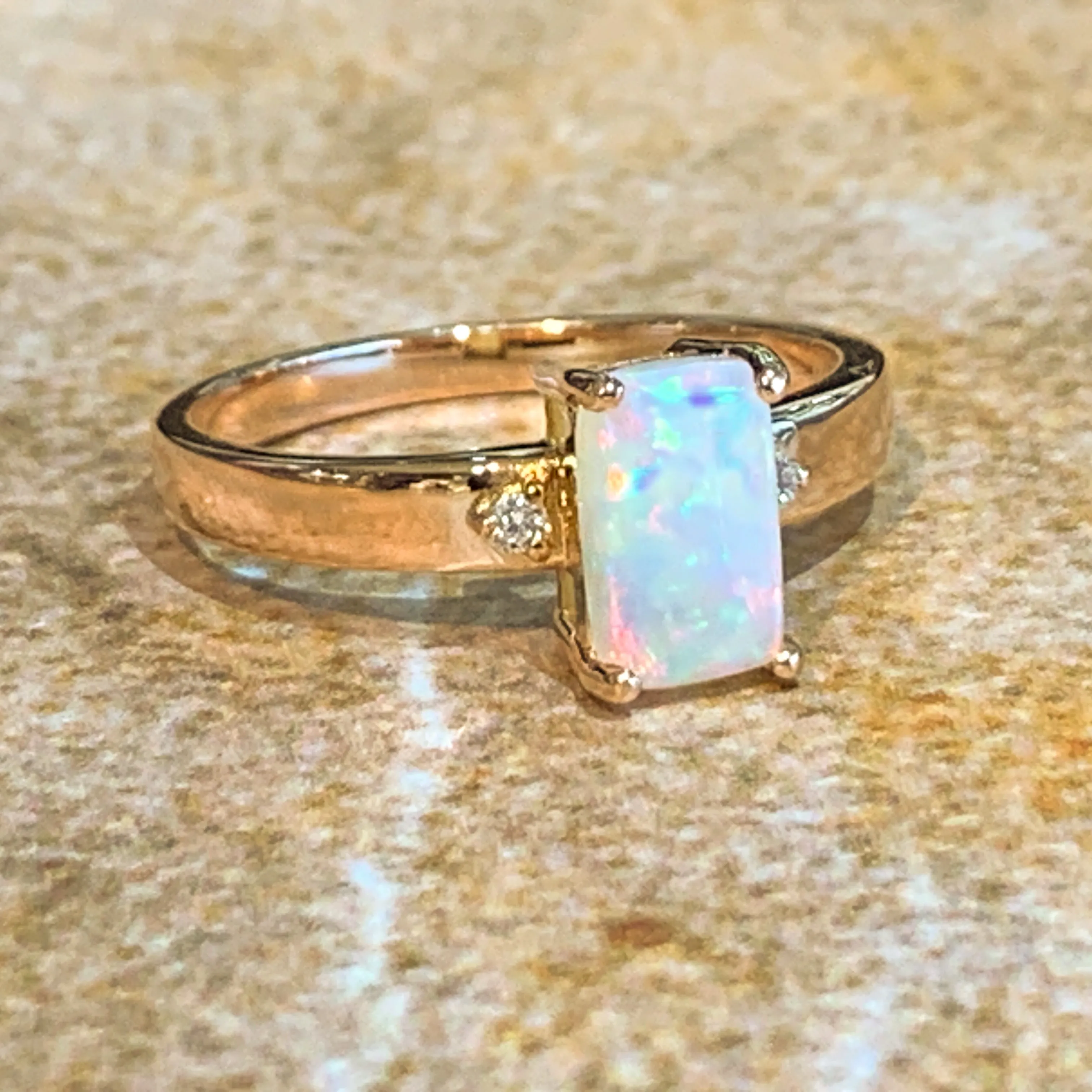 18kt Rose Gold Rectangular Opal 0.9ct and Diamond ring