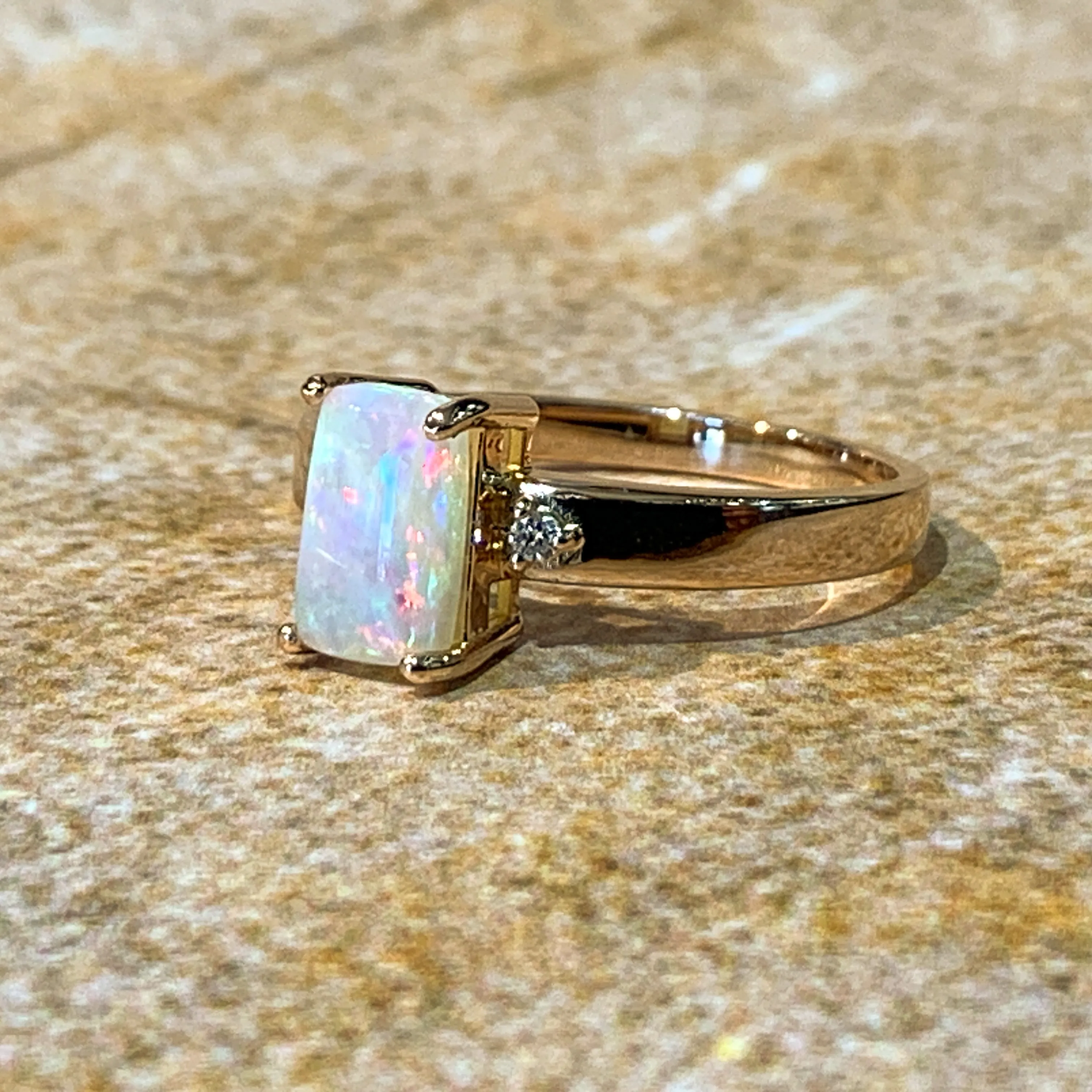 18kt Rose Gold Rectangular Opal 0.9ct and Diamond ring