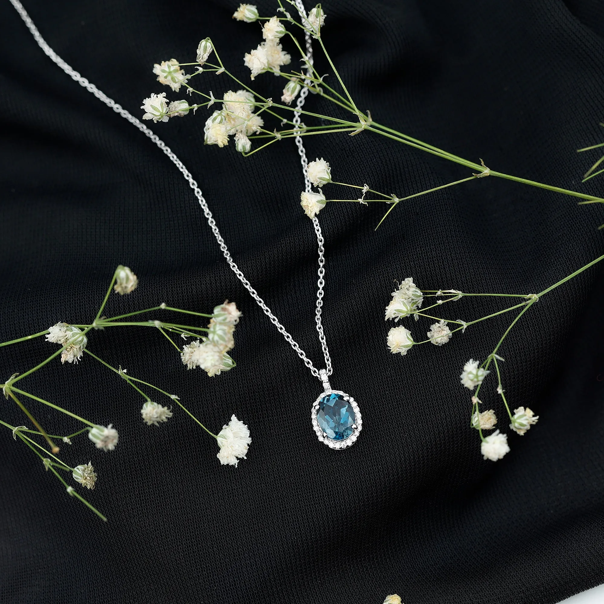 Classic Oval London Blue Topaz and Diamond Halo Pendant