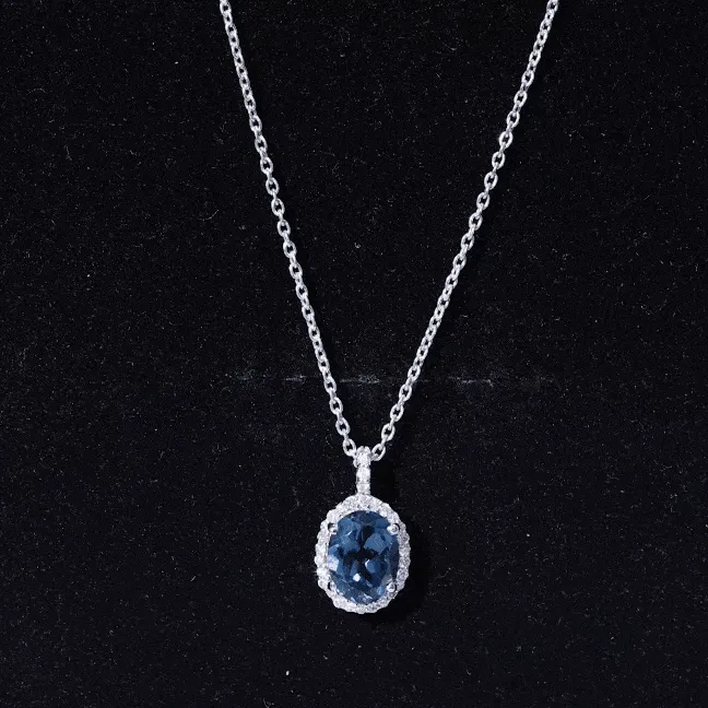 Classic Oval London Blue Topaz and Diamond Halo Pendant